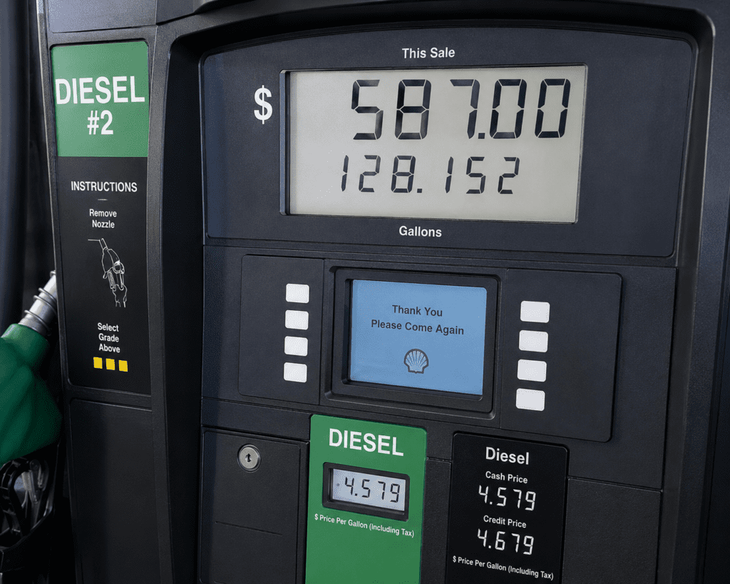 image of a fuel pump and the cost of fuel when running heavy equipment.